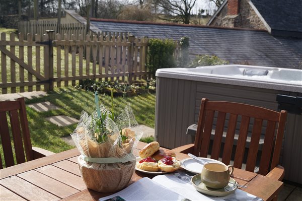 Private hot tub and garden with views over main gardens