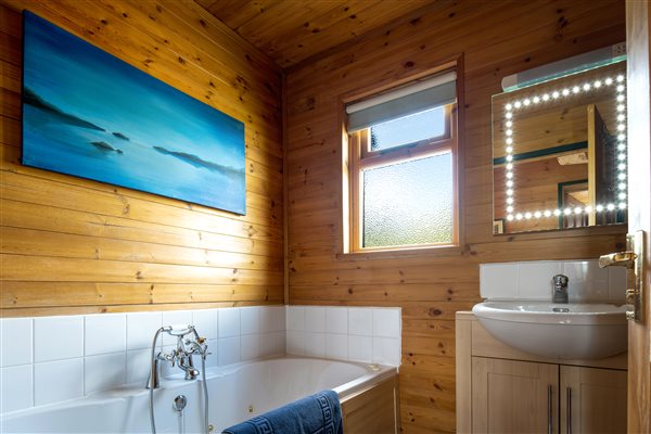 family bathroom with whirlpool bath 